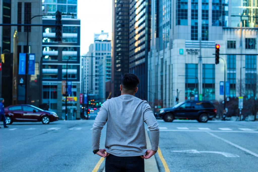 Man walking in the middle of the street