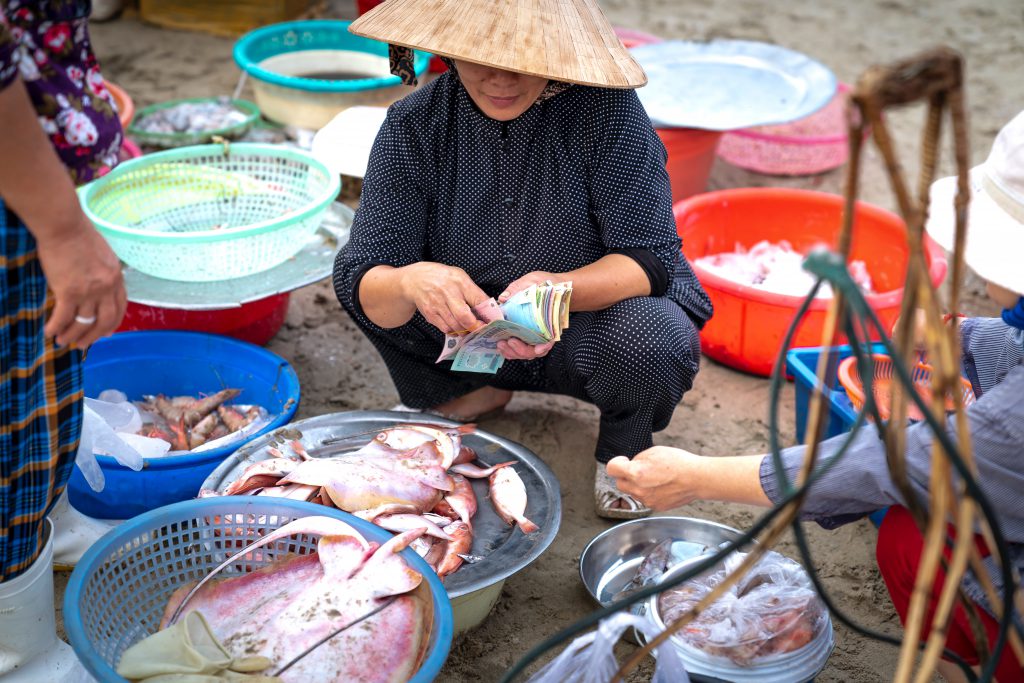 A woman counting money.