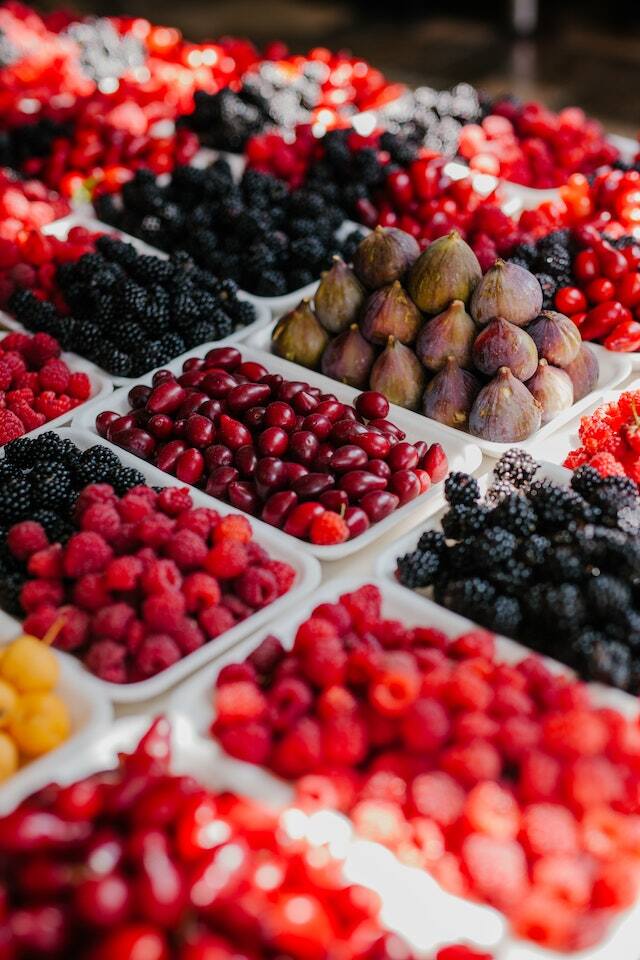 Various berries displayed on a table.