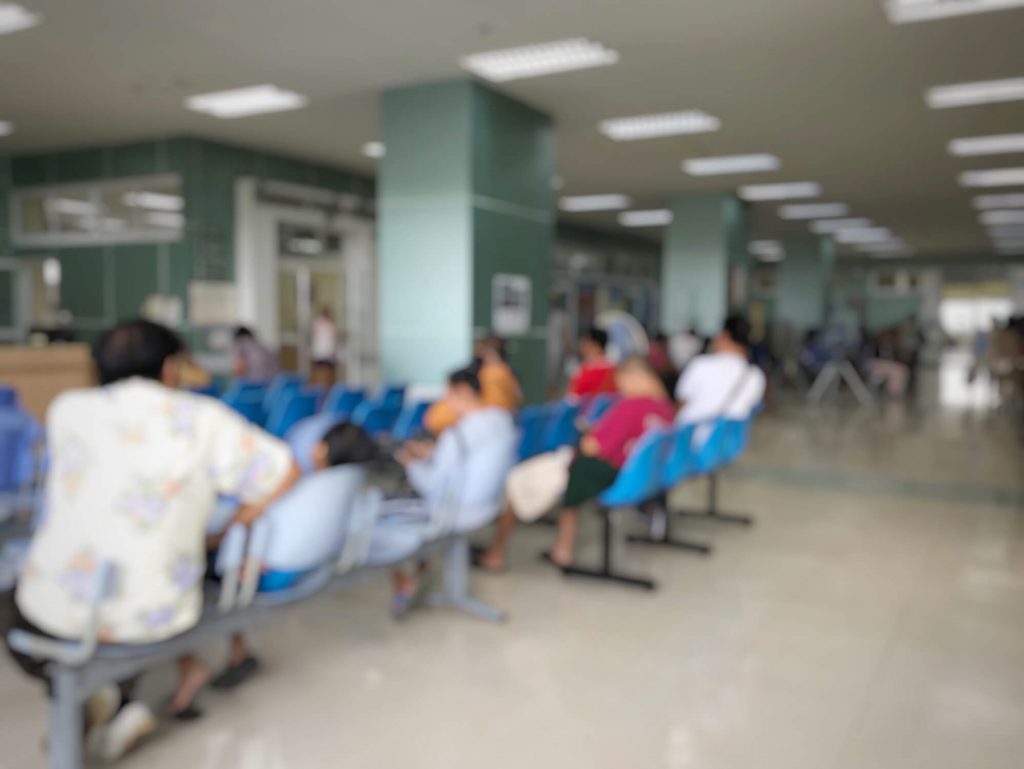 People sitting in a waiting room.